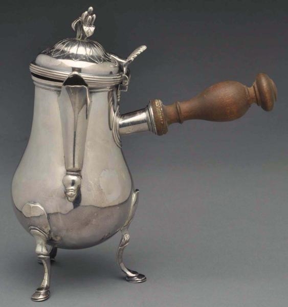 A FRENCH PROVINCIAL SILVER COFFEE POT.            