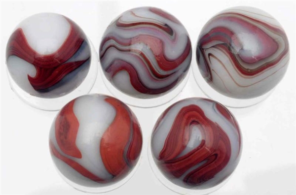 LOT OF 5: AKRO WHITE OXBLOOD MARBLES.             