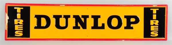 EMBOSSED TIN DUNLOP TIRES SIGN.                   