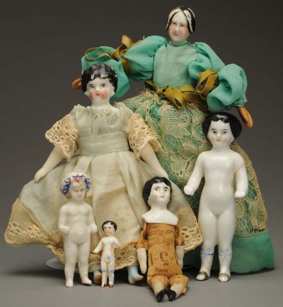 LOT OF 6 CHINA DOLLS.                             