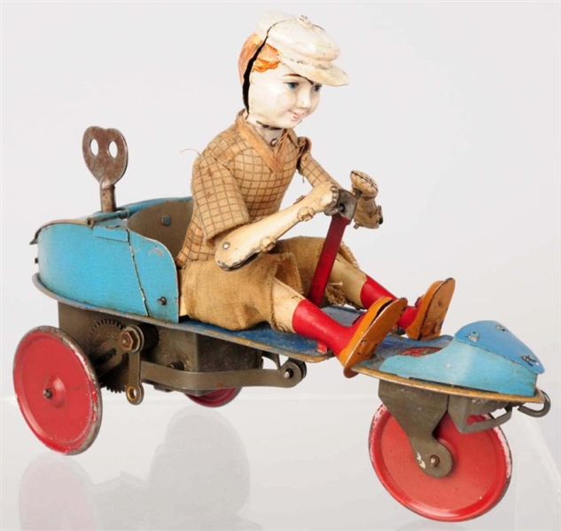 TIN LITHO MARTIN SCOOTER WIND-UP TOY.             