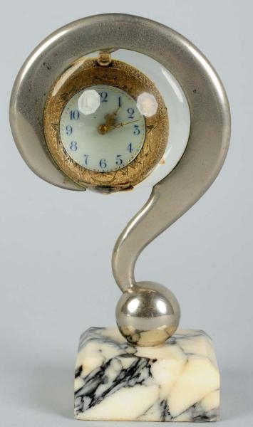 MAGNIFYING GLASS WATCH HOLDER ON MARBLE BASE.     
