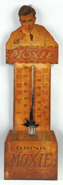 LARGE EMBOSSED TIN MOXIE THERMOMETER.             
