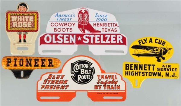 LOT OF 5: ASSORTED LICENSE PLATE TOPPERS.         