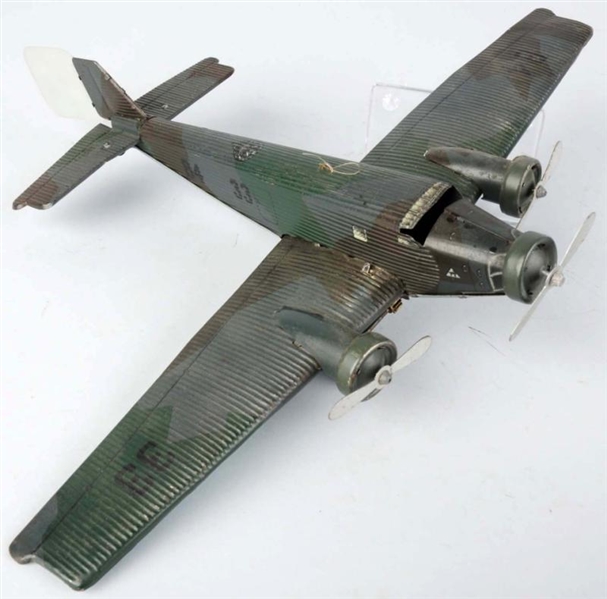 TIN LITHO TIPPCO AIRPLANE WIND-UP TOY.            