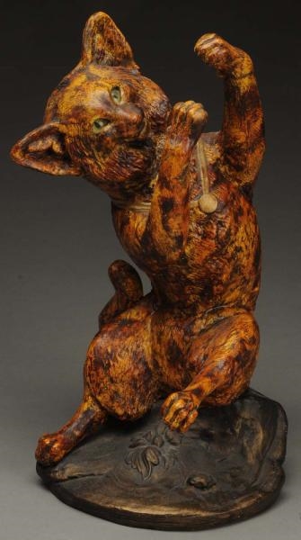 TERRACOTTA CAT WITH GLASS EYES.                   