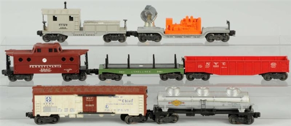 LOT OF 7: LIONEL FREIGHT CARS.                    