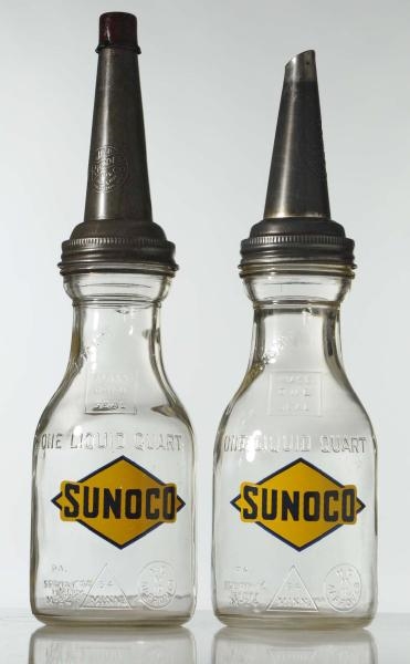 LOT OF 2: GLASS SUNOCO OIL BOTTLES.               