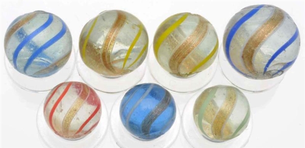 LOT OF 7: BANDED LUTZ MARBLES.                    