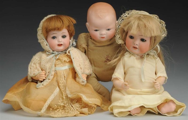 LOT OF 3 BISQUE BABY DOLLS.                       