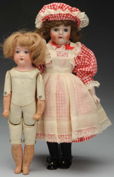 LOT OF 2 BISQUE DOLLS.                            