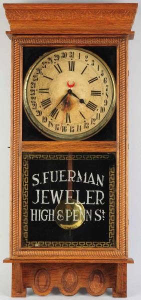 S. FUERMAN JEWELER CALENDAR CLOCK.                