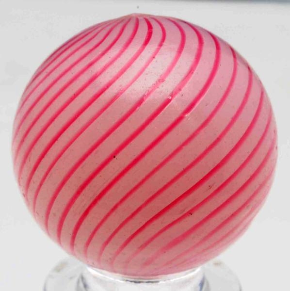 WHITE BASE CLAMBROTH MARBLE WITH PINK LINES.      