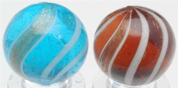 LOT OF 2: COLOR GLASS BANDED LUTZ MARBLES.        