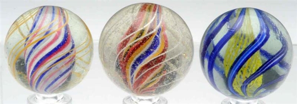 LOT OF 3: SWIRL MARBLES.                          