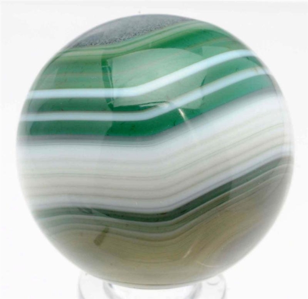 HAND FACETED BULLSEYE GREEN-DYED AGATE MARBLE.    