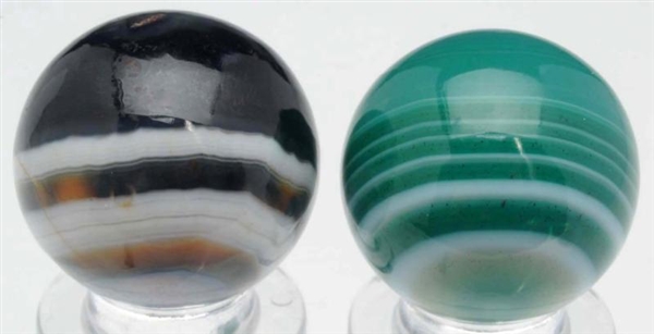 LOT OF 2: DYED GERMAN AGATE MARBLES.              