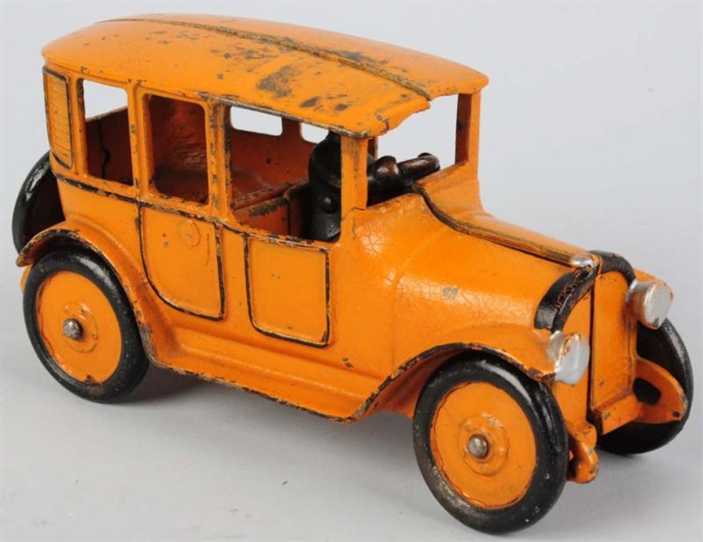 CAST IRON TAXI CAB TOY.                           