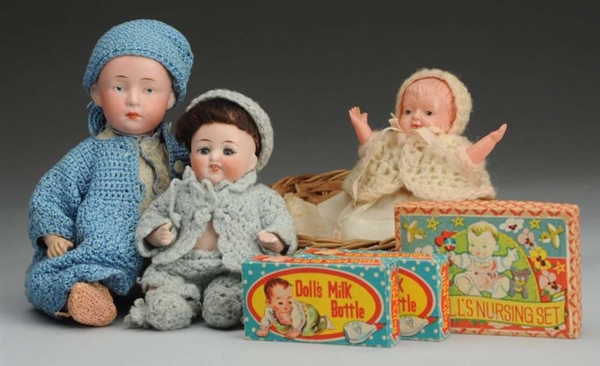 LOT OF 3 BABY DOLLS AND ACCESSORIES.              