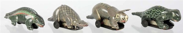 SET OF 4 TIN LINEMAR DINOSAUR FRICTION TOYS.      