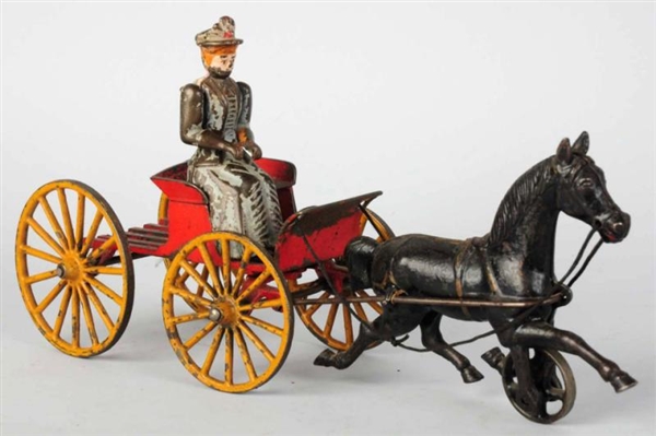 CAST IRON HORSE-DRAWN SULKY TOY.                  