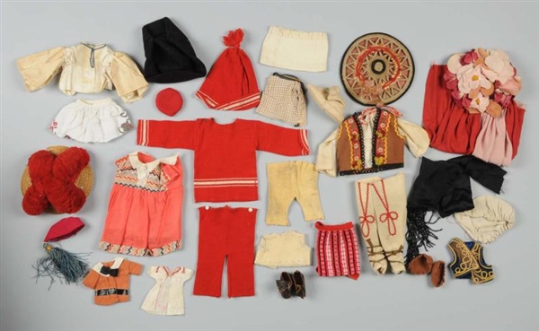 LOT OF ANTIQUE DOLL CLOTHING.                     