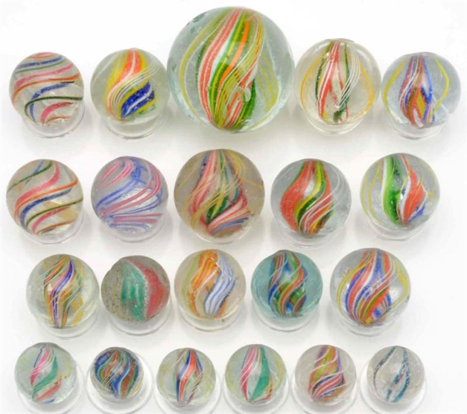 LOT OF 21: DIVIDED CORE SWIRL MARBLES.            