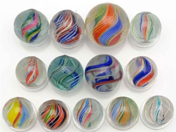 LOT OF 13: DIVIDED CORE SWIRL MARBLES.            