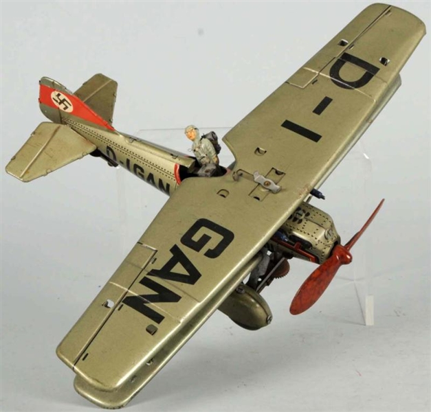 TIN LITHO AIRPLANE WIND-UP TOY.                   