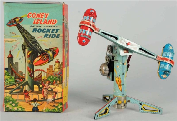 TIN LITHO CONY ISLAND ROCKET RIDE BATTERY-OP TOY. 