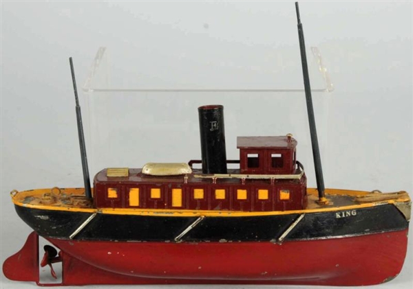 IVES HAND-PAINTED CLOCKWORK TUG BOAT TOY.         