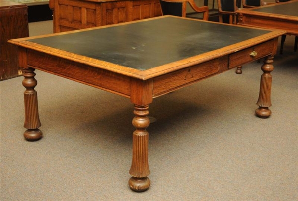 OAK CONFERENCE TABLE WITH LEATHER TOP.            