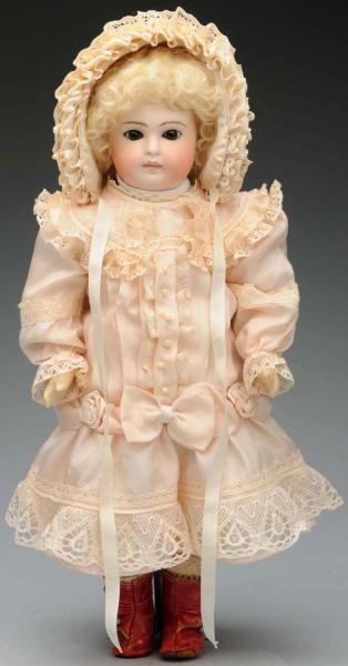 WINSOME BELTON STYLE CHILD DOLL.                  