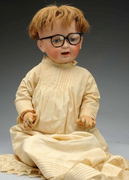 LAUGHING GERMAN BISQUE CHARACTER BABY DOLL.       