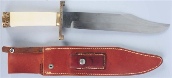 BOWIE KNIFE WITH CLIP POINT SABER GROUND BLADE.   