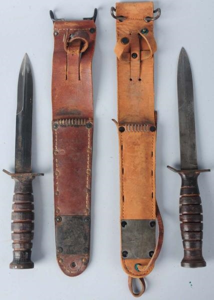 LOT OF 2: M3 TRENCH KNIVES & M6 LEATHER SCABBARDS 