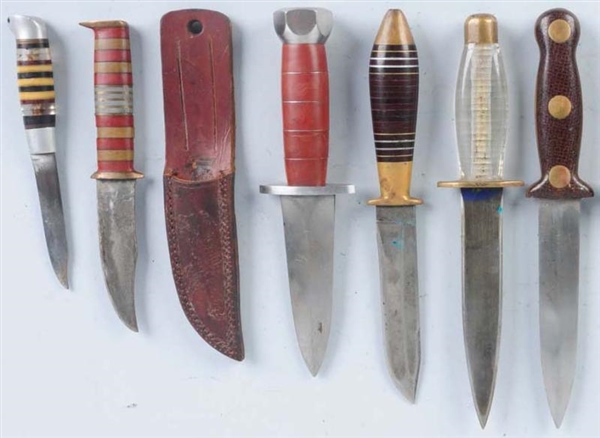 LOT OF 10: UNSIGNED HANDMADE THEATER KNIFES.      