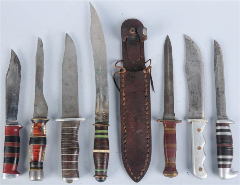 LOT OF 7: UNSIGNED HANDMADE THEATER KNIVES.       