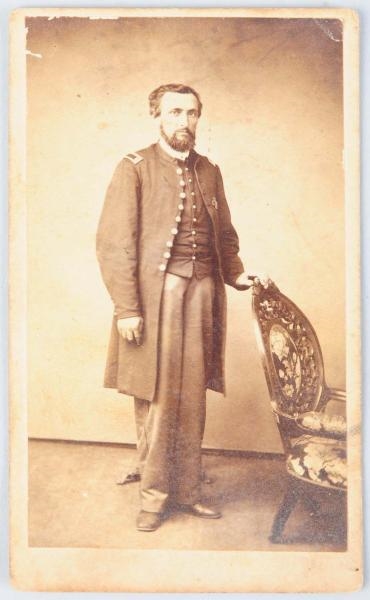 CARTE VISTA OF SOLDIER WITH CHAIR.                