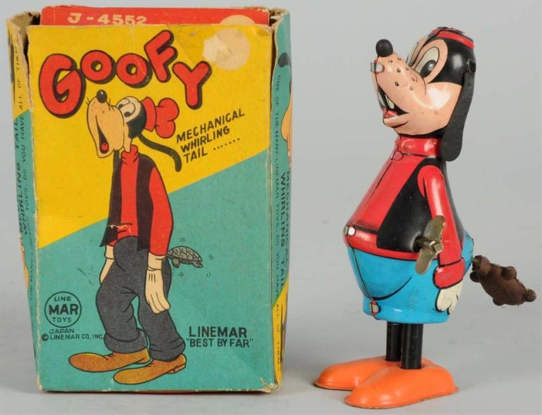 TIN LITHO LINEMAR DISNEY GOOFY WHIRLING TAIL TOY. 
