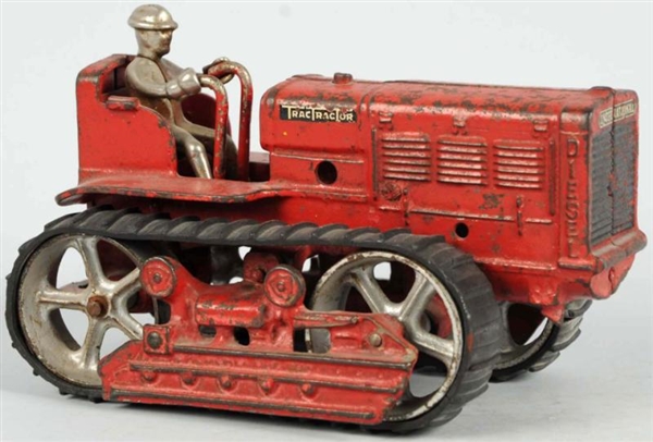 CAST IRON TRACTRACTOR TOY.                        