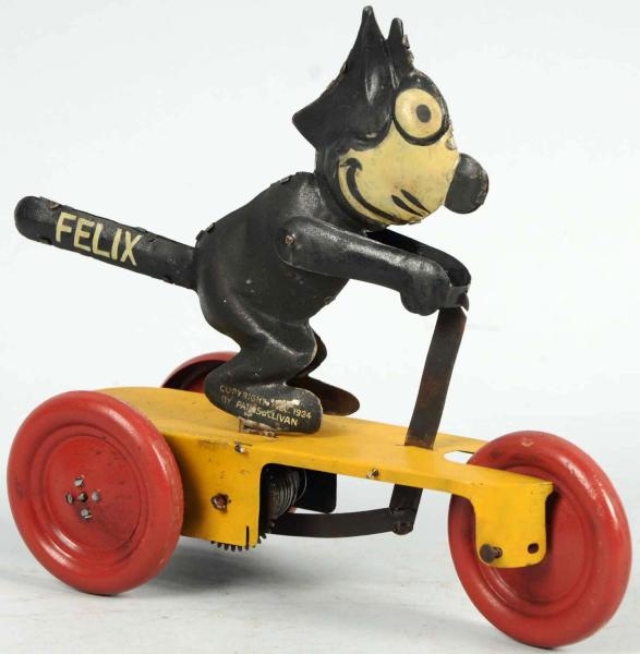 TIN LITHO FELIX THE CAT SCOOTER WIND-UP TOY.      