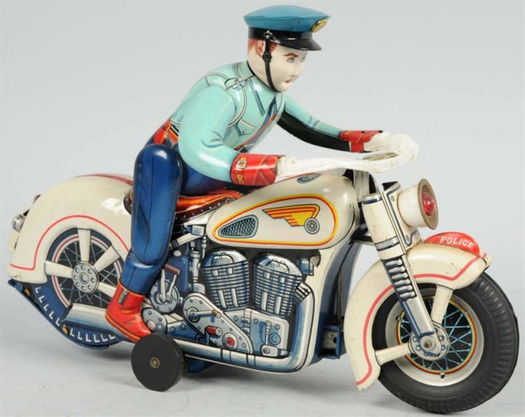 POLICE MOTORCYCLE BATTERY-OPERATED TOY.           