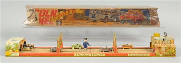 TIN LITHO UNIQUE ART LINCOLN TUNNEL WIND-UP TOY.  
