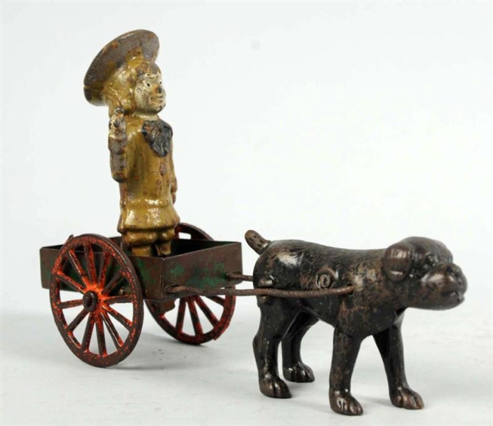 CAST IRON BUSTER BROWN & TIGE CART TOY.           