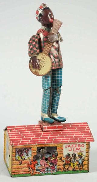 TIN STRAUSS JAZZBO JIM ROOF DANCING WIND-UP TOY.  