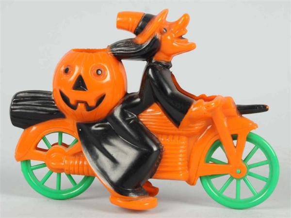HALLOWEEN PLASTIC WITCH ON MOTORCYCLE.            