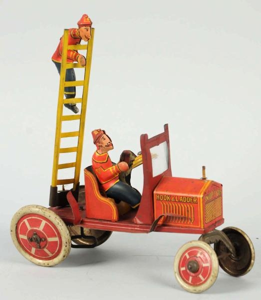 TIN MARX SNOOPY GUS LADDER TRUCK WIND-UP TOY.     