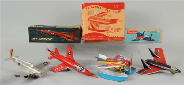 LOT OF 4: TIN AIRPLANE WIND-UP & FRICTION TOYS.   