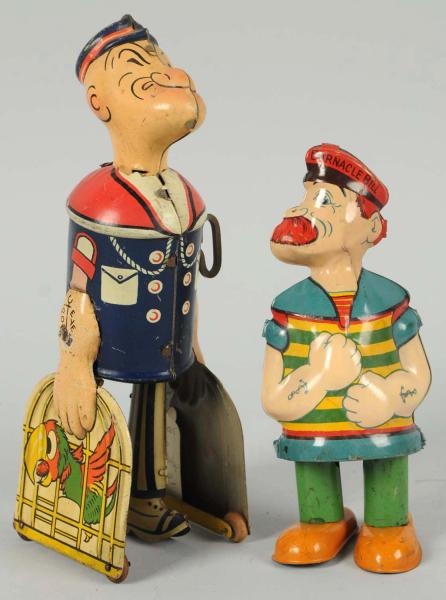 LOT OF 2: TIN LITHO CHARACTER TOYS.               